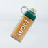 A clear plastic dog water bottle with a dark green cap and loop handle, filled with tan liquid, featuring the word 'woof' printed in white on the front, set against a light gray background.